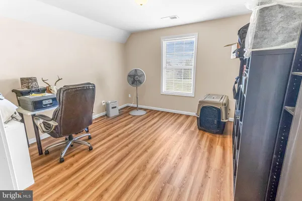 a room with furniture and a window