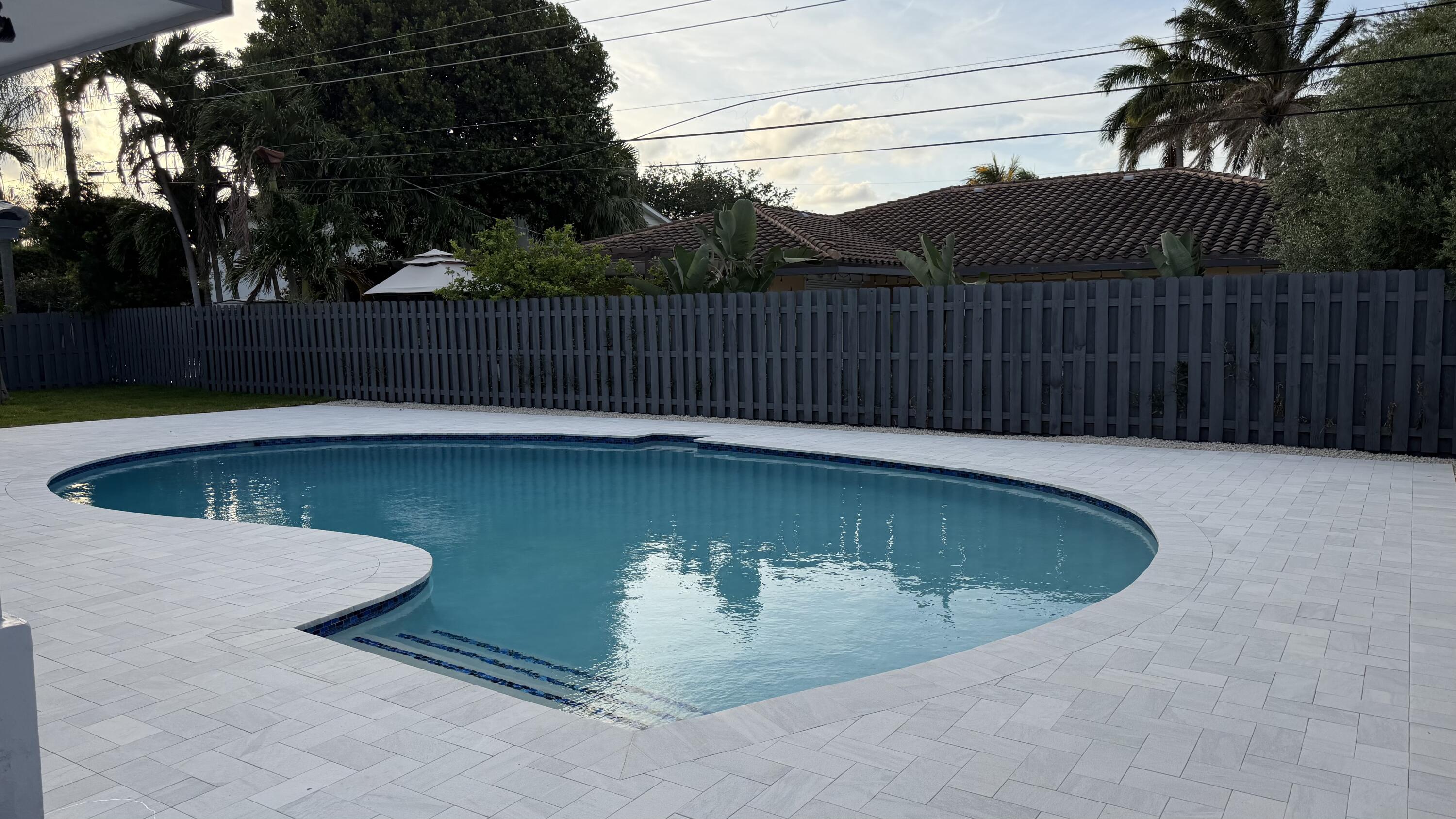 2521 Northeast 45th Street Lighthouse Point, FL 33064 - Photo 25 of 25 a view of a backyard with a small cabin