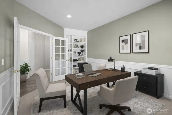 a view of a workspace with furniture