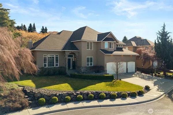 a view of house with outdoor space swimming pool and furniture