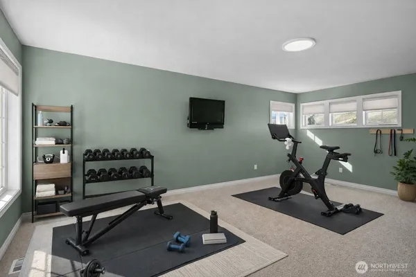 a view of a room with gym equipment