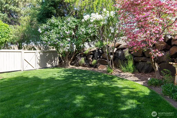 a view of backyard with green space