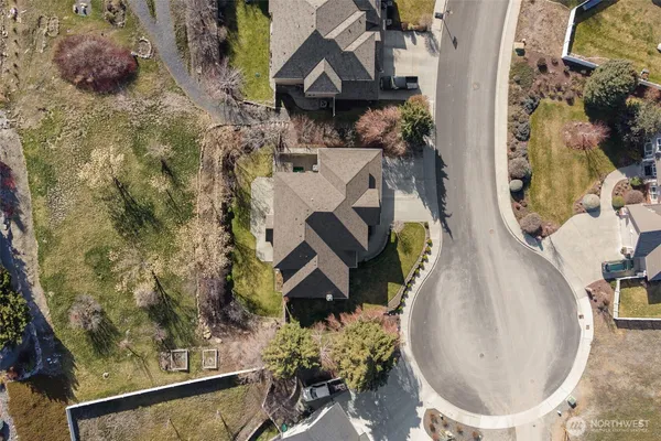 an aerial view of a house with swimming pool