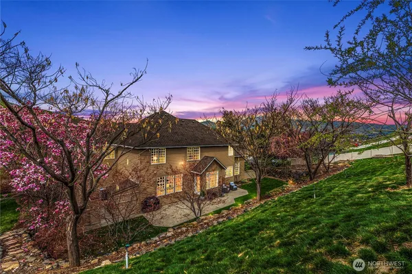 a backyard of a house with lots of green space