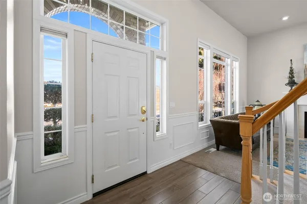 a view of a livingroom with furniture and windows