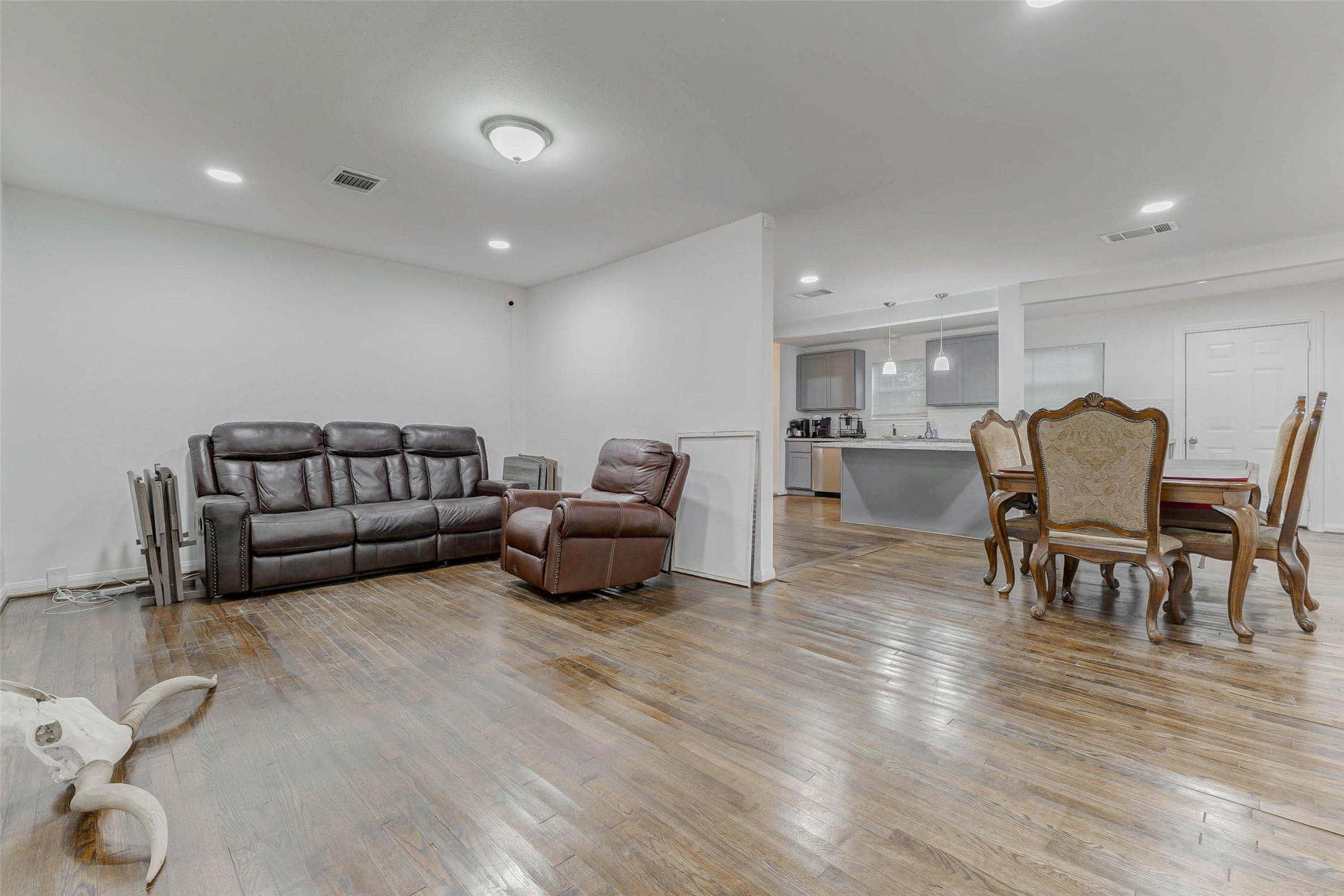 907 Whitaker Avenue Pasadena, TX 77506 - Photo 2 of 35 a living room with furniture and a wooden floor