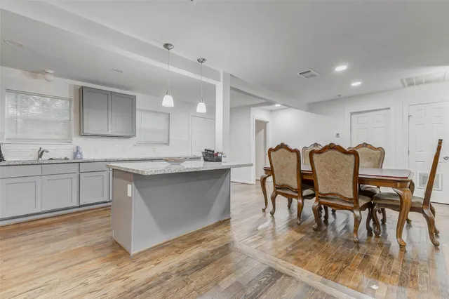 a view of an empty room and fire place