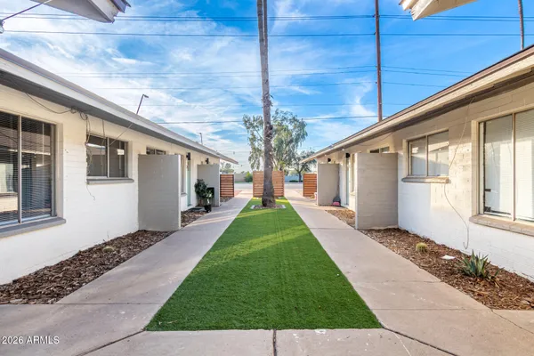a porch with seating space and yard