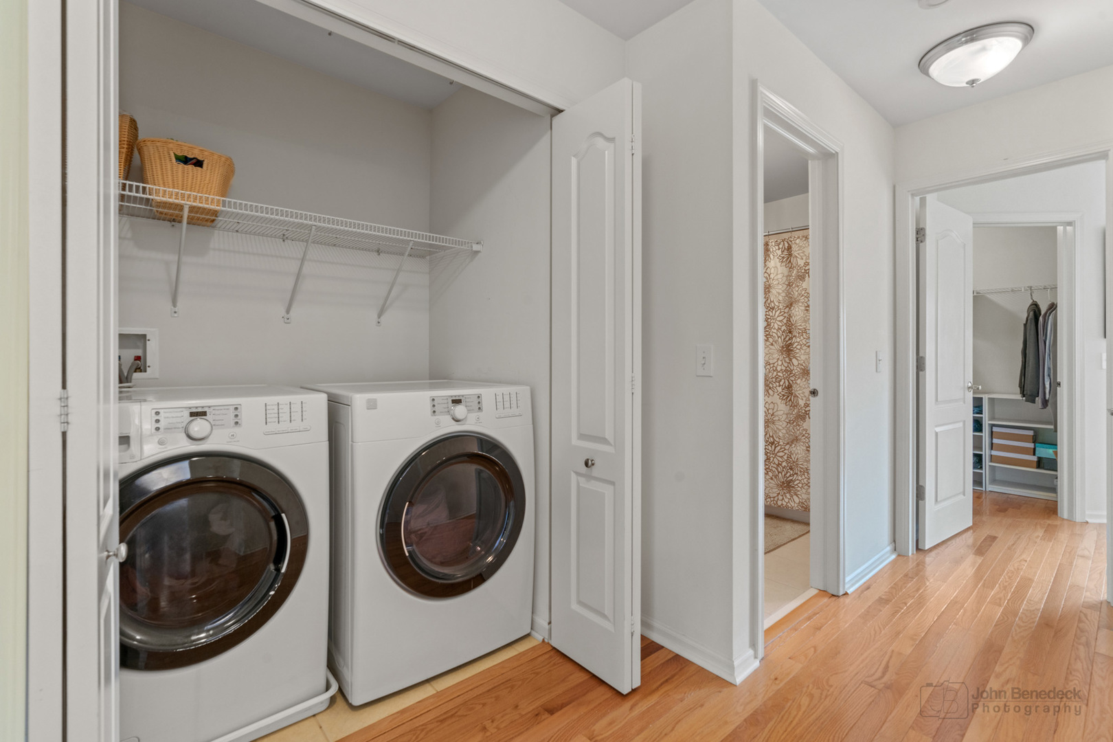 220 River Front Drive Mount Prospect, IL 60056 - Photo 29 of 33 a view of a hallway with washer and dryer