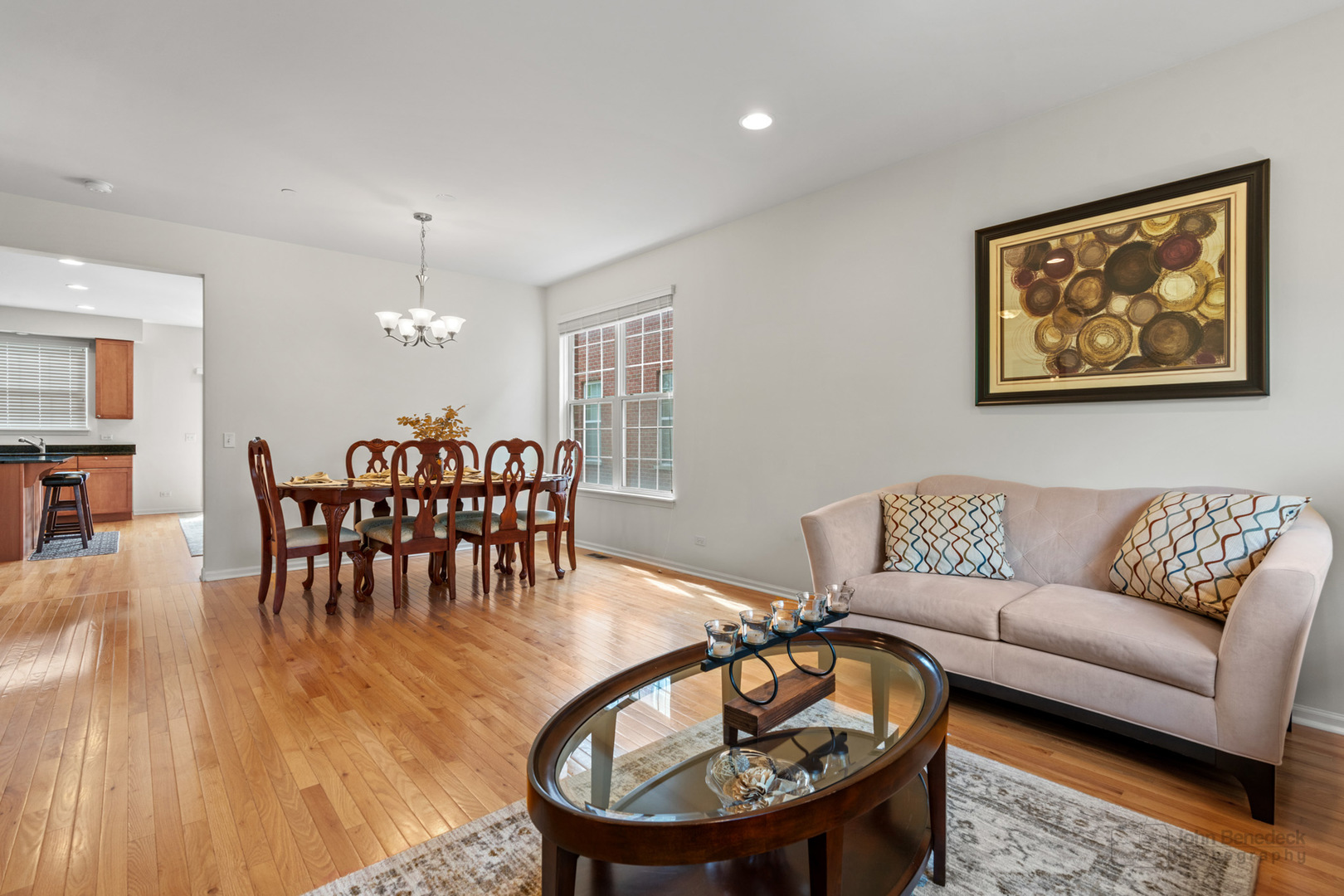220 River Front Drive Mount Prospect, IL 60056 - Photo 5 of 33 a living room with furniture a dining table and a wooden floor