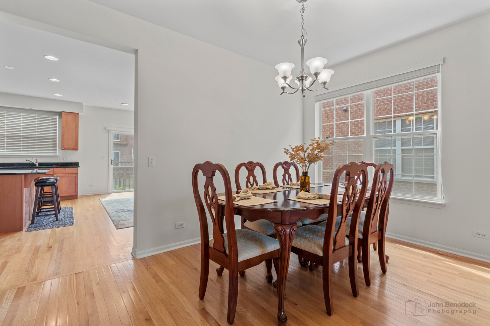 220 River Front Drive Mount Prospect, IL 60056 - Photo 6 of 33 a view of a dining room with furniture window and wooden floor
