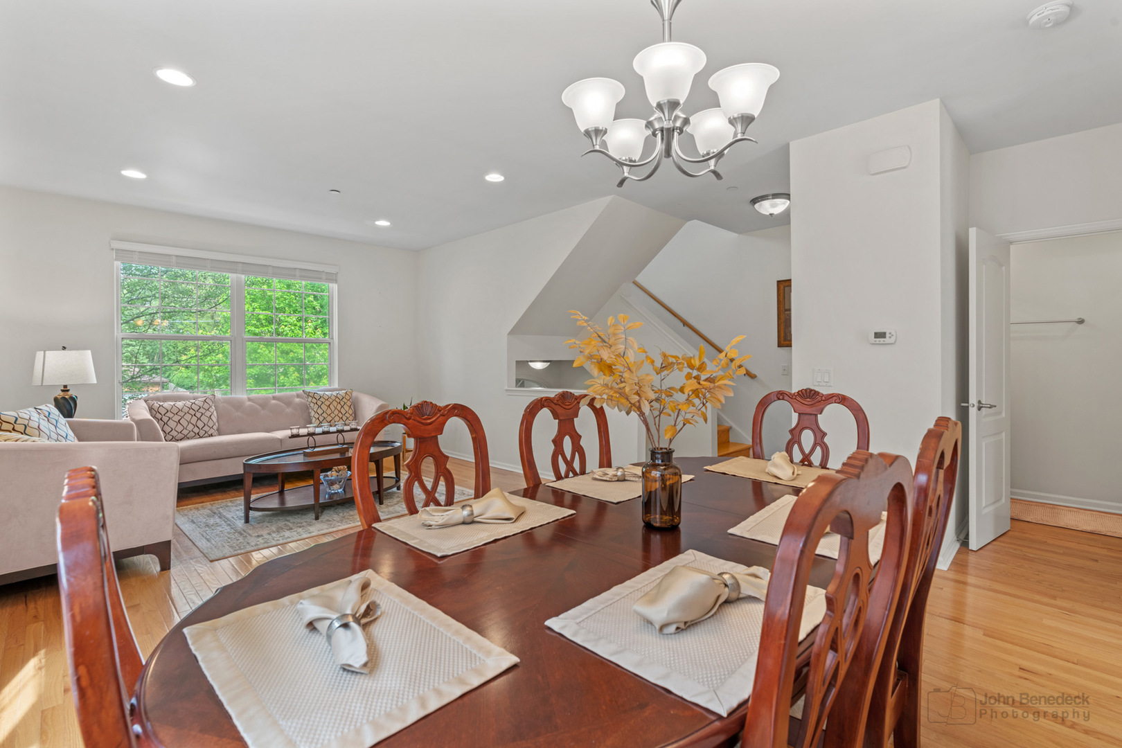 220 River Front Drive Mount Prospect, IL 60056 - Photo 7 of 33 a view of a dining room with furniture a large window and wooden floor