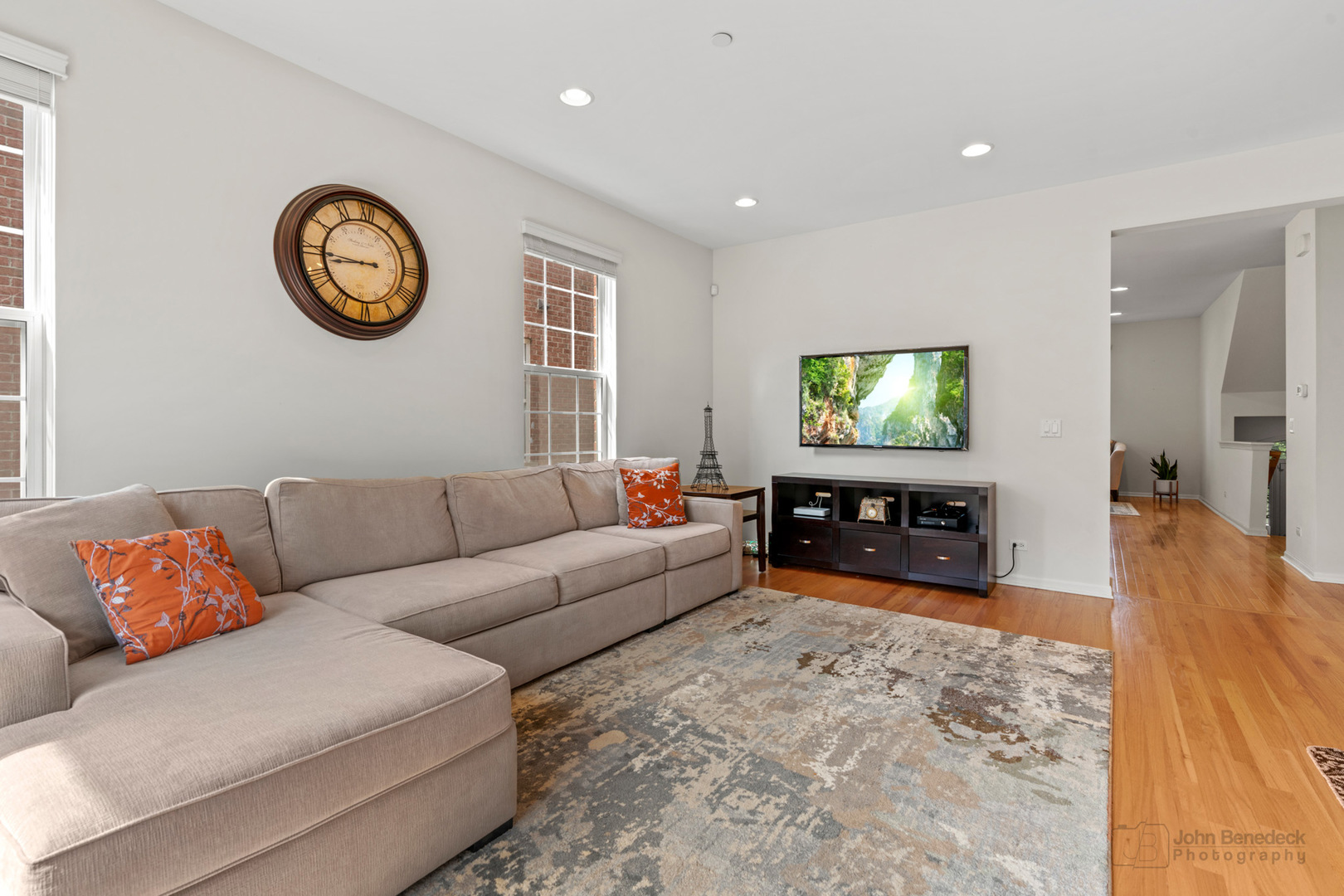 220 River Front Drive Mount Prospect, IL 60056 - Photo 10 of 33 a living room with furniture and a flat screen tv