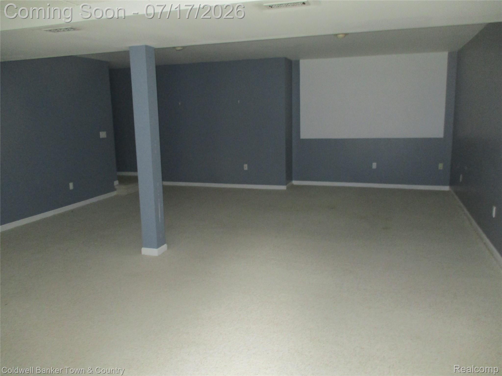 1996 Triangle Lake Road Howell, MI 48843 - Photo 24 of 32 Spacious room featuring neutral wall-to-wall carpeting and finished walls