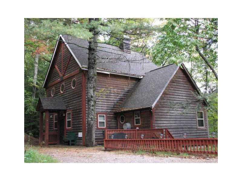 56 Red Hen Road Dahlonega, GA 30533 - Photo 1 of 1 Exterior Front. Rustic cabin in the pines