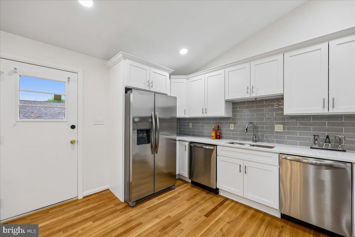 1105 Lamberton Drive Silver Spring, MD 20902 - Photo 14 of 87 Modern kitchen with sleek finishes.