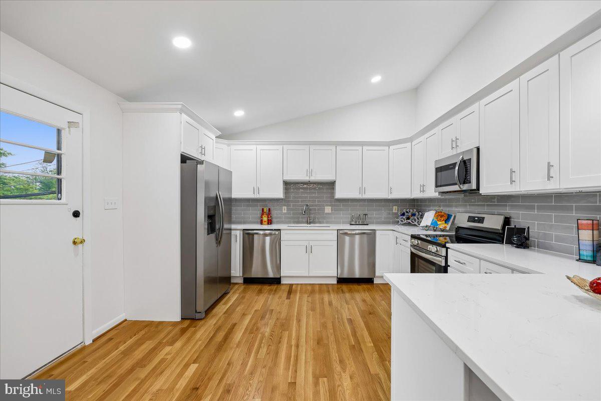 1105 Lamberton Drive Silver Spring, MD 20902 - Photo 17 of 87 Modern kitchen with sleek finishes.