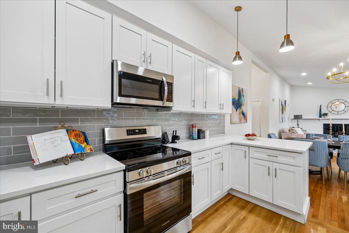 1105 Lamberton Drive Silver Spring, MD 20902 - Photo 18 of 87 Modern kitchen with sleek finishes.