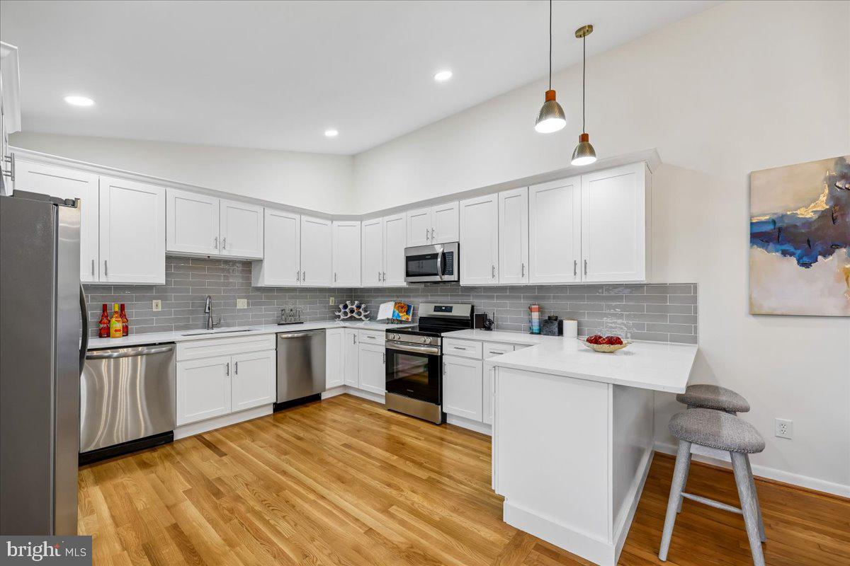 1105 Lamberton Drive Silver Spring, MD 20902 - Photo 2 of 87 Modern kitchen with sleek finishes.