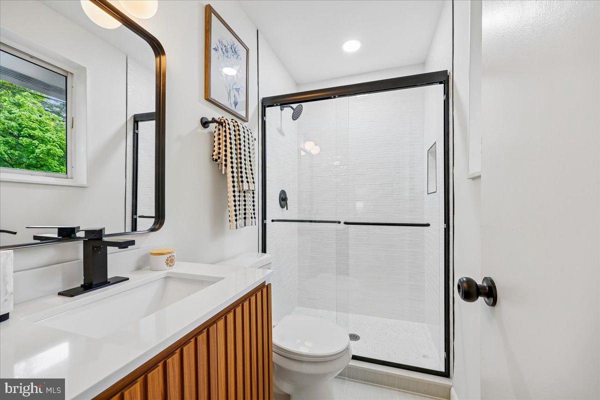 1105 Lamberton Drive Silver Spring, MD 20902 - Photo 32 of 87 Sleek modern bathroom with natural light.