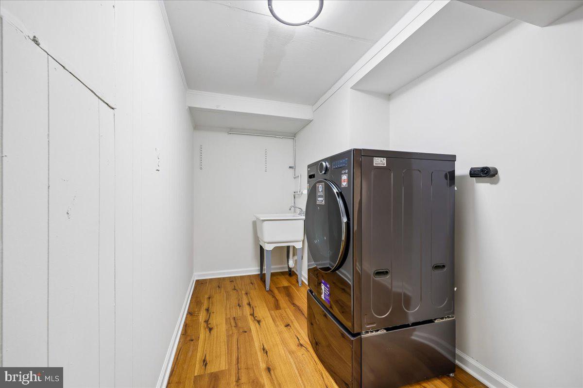 1105 Lamberton Drive Silver Spring, MD 20902 - Photo 40 of 87 Modern laundry space with sleek appliances.