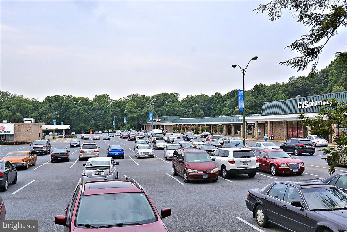1105 Lamberton Drive Silver Spring, MD 20902 - Photo 66 of 87 Busy shopping plaza with lush backdrop.