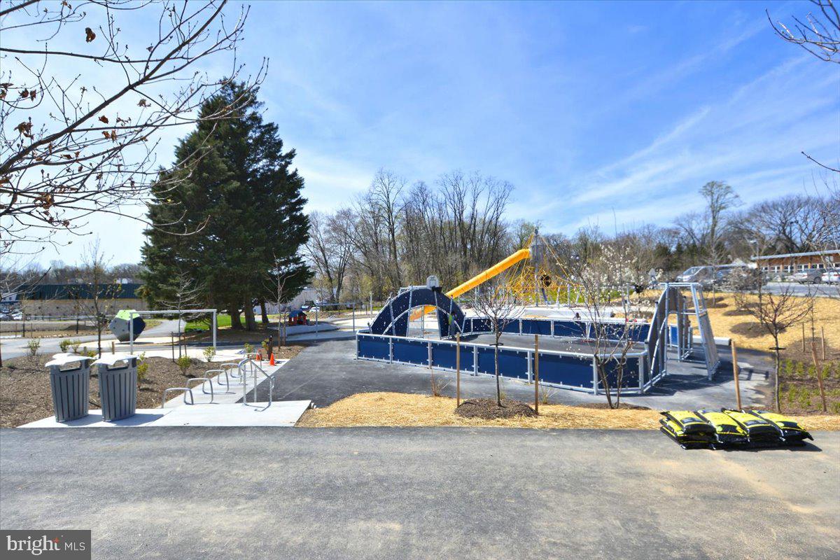 1105 Lamberton Drive Silver Spring, MD 20902 - Photo 82 of 87 Vibrant playground under blue skies.