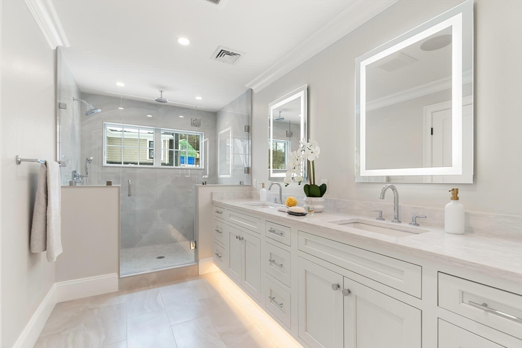 2 Abby Road Winchester, MA 01890 - Photo 24 of 42 a bathroom with a granite countertop sink mirror and double