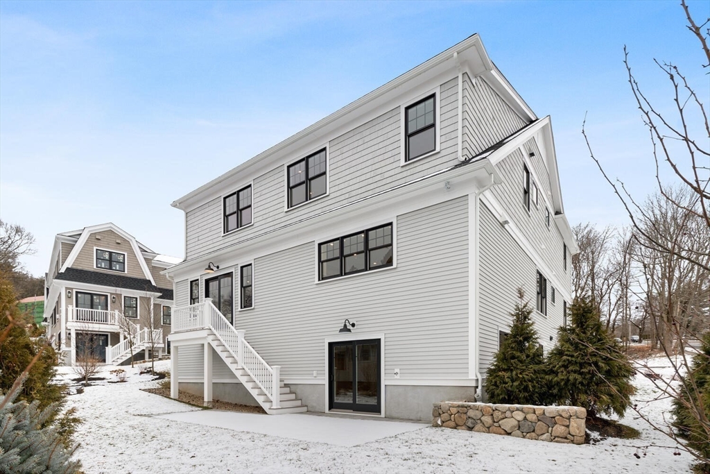 2 Abby Road Winchester, MA 01890 - Photo 35 of 42 a front view of a house with a yard