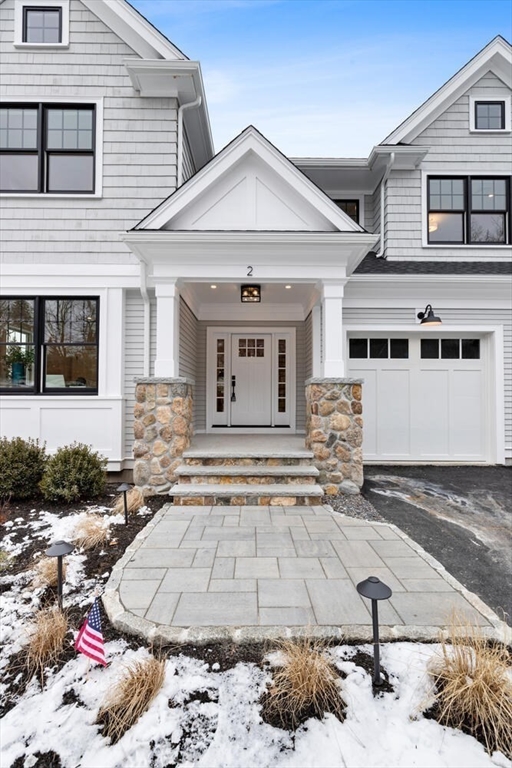 2 Abby Road Winchester, MA 01890 - Photo 6 of 42 a front view of a house with a yard