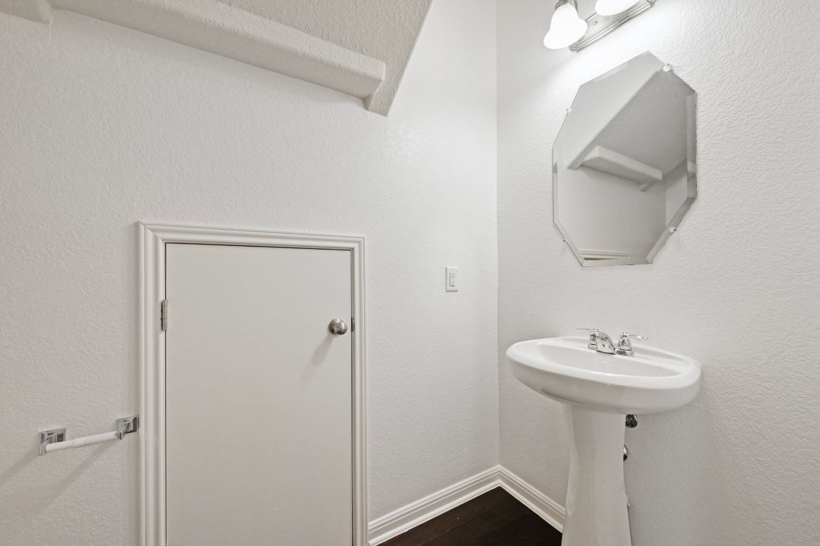 11248 Lost Maples Trail, Unit 11248 Austin, TX 78748 - Photo 12 of 22 a bathroom with a sink and a mirror