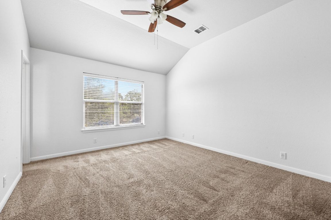 11248 Lost Maples Trail, Unit 11248 Austin, TX 78748 - Photo 15 of 22 a view of an empty room with a window