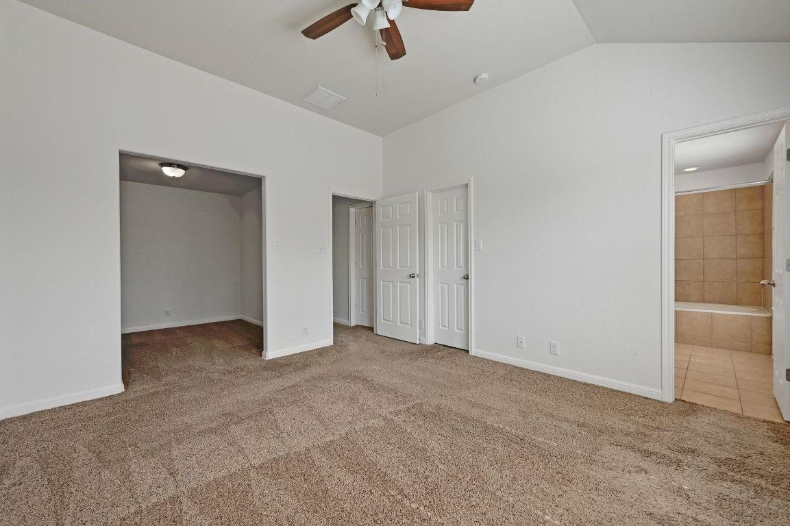 11248 Lost Maples Trail, Unit 11248 Austin, TX 78748 - Photo 16 of 22 an empty room with fan