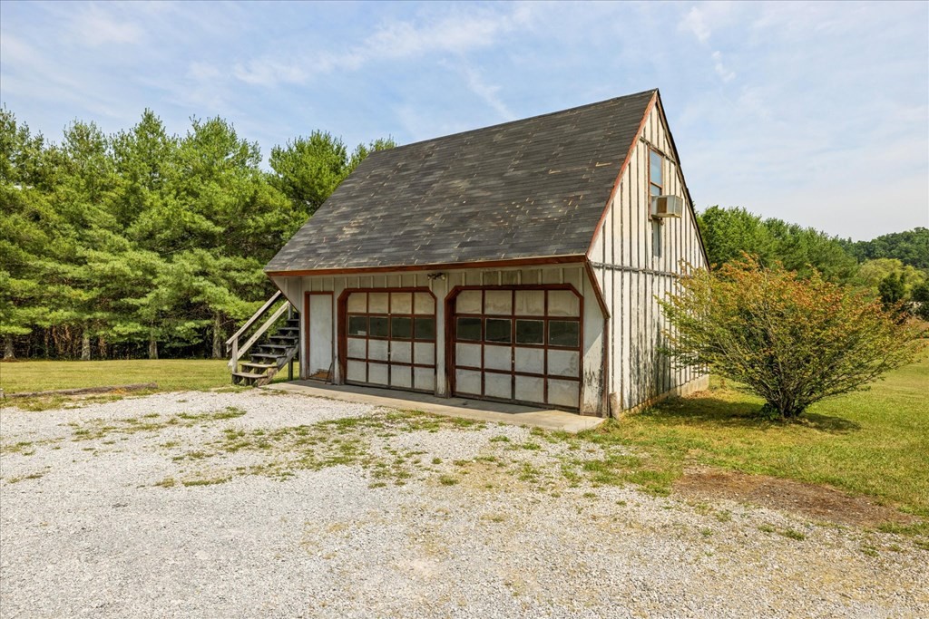 3221 Bryan Road Kodak, TN 37764 - Photo 23 of 31 a view of a house with a yard