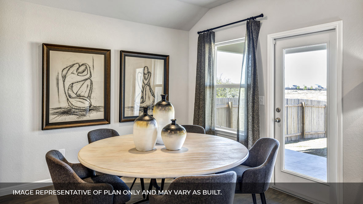 236 Gilmer Lane Buda, TX 78610 - Photo 13 of 30 a view of a dining room with furniture window and wooden floor
