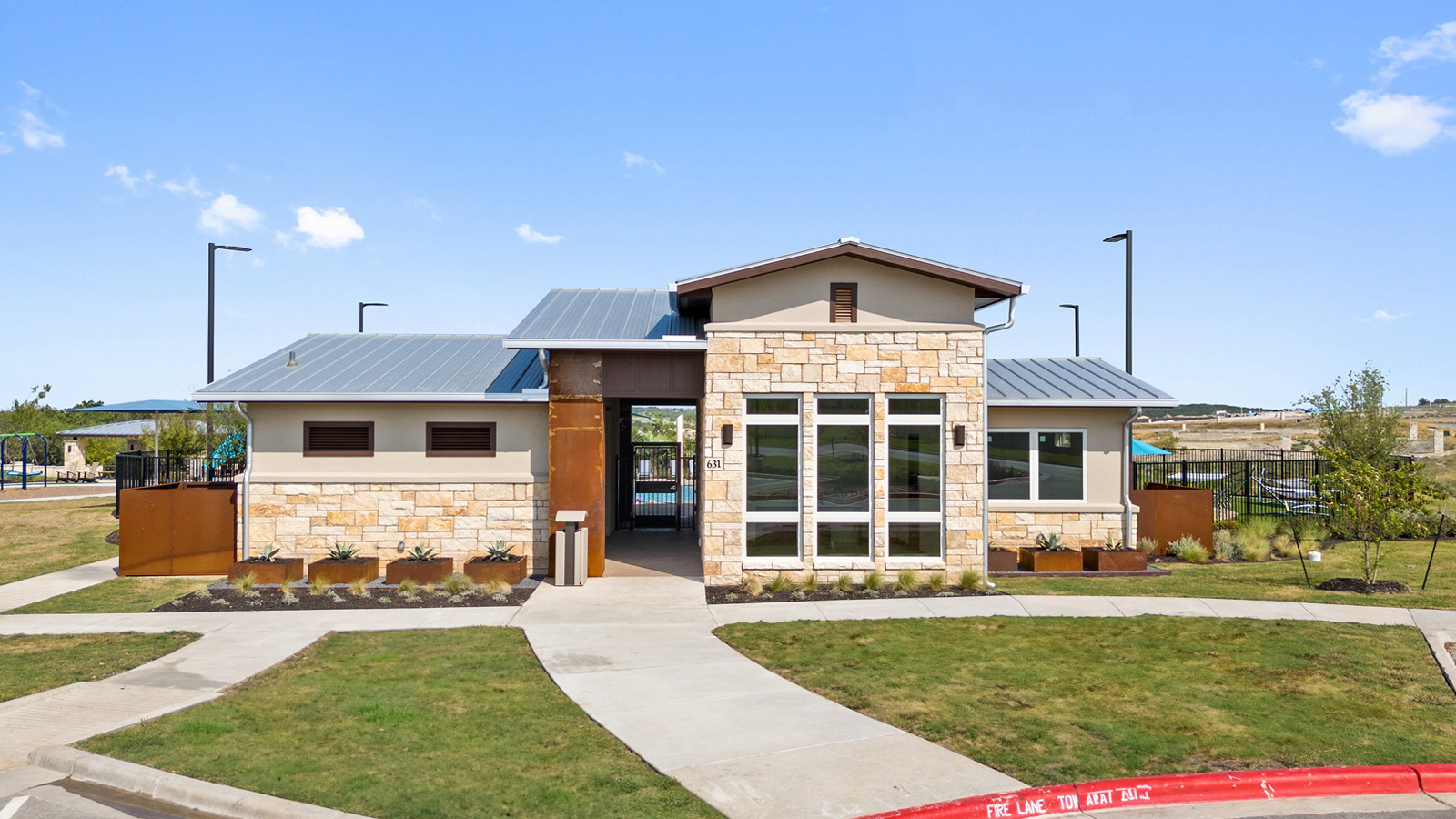 236 Gilmer Lane Buda, TX 78610 - Photo 23 of 30 a front view of a house with a yard
