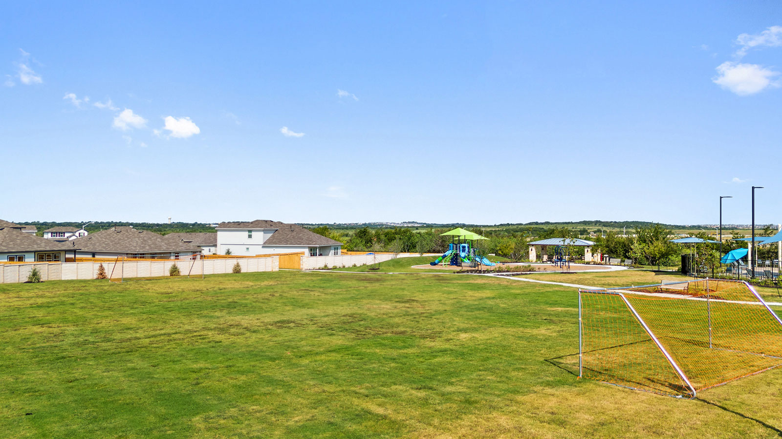 236 Gilmer Lane Buda, TX 78610 - Photo 28 of 30 a view of a tennis court