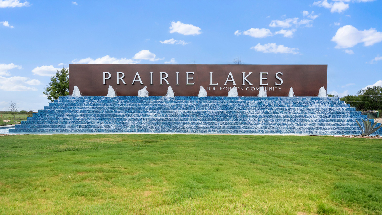 236 Gilmer Lane Buda, TX 78610 - Photo 29 of 30 a view of outdoor space with a garden and trees