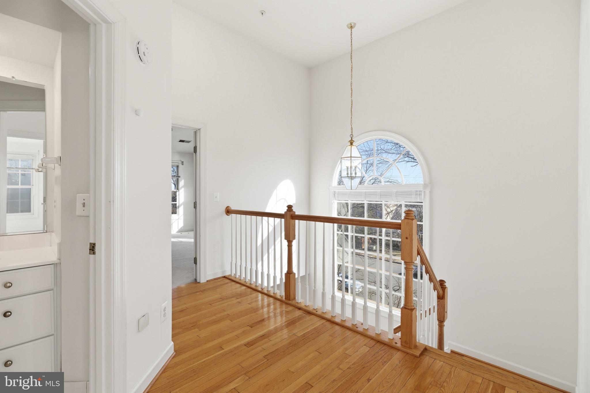 1817 Fallbrook Lane Vienna, VA 22182 - Photo 19 of 50 a view of entryway with wooden floor