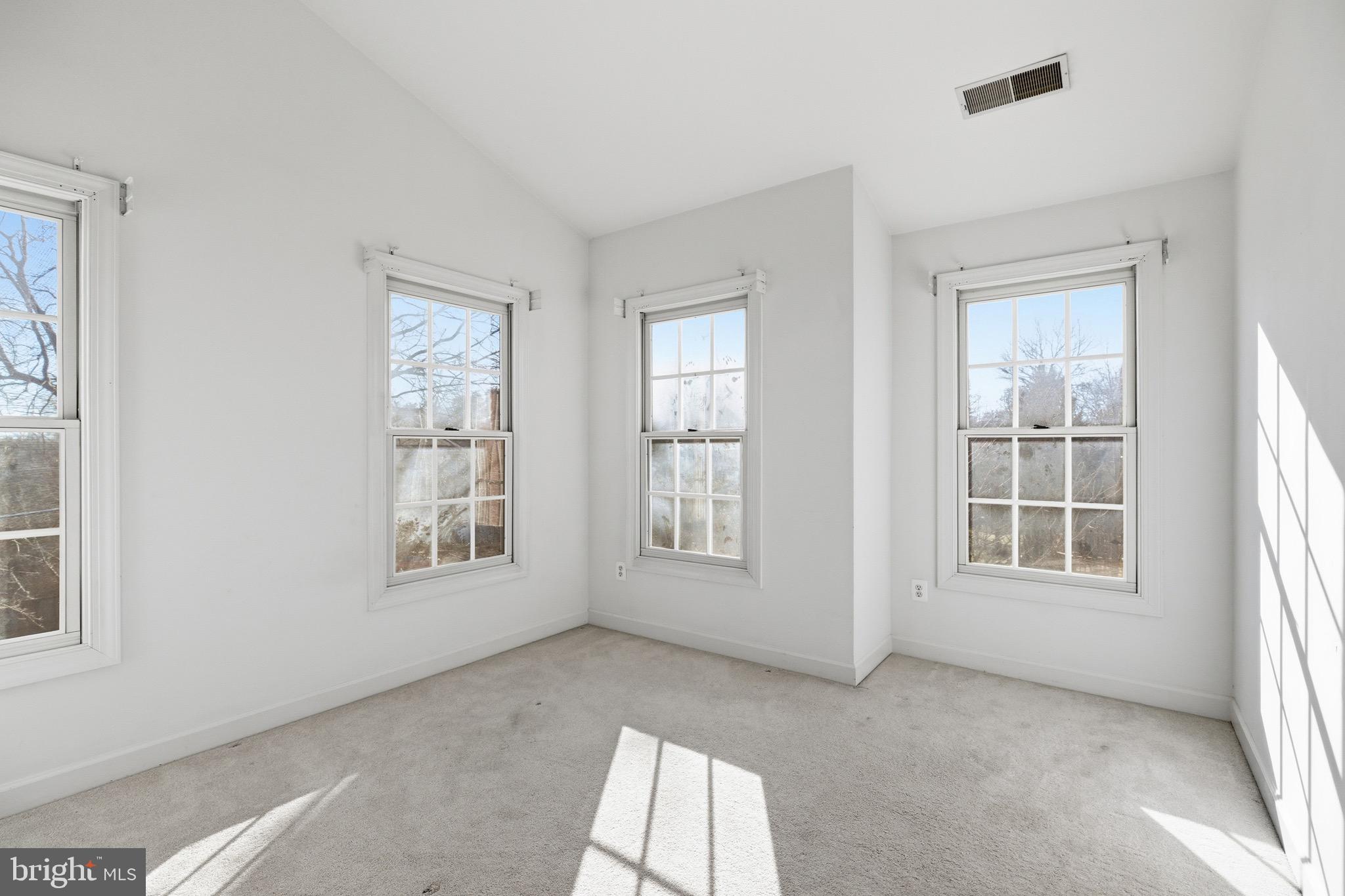 1817 Fallbrook Lane Vienna, VA 22182 - Photo 27 of 50 an empty room with windows