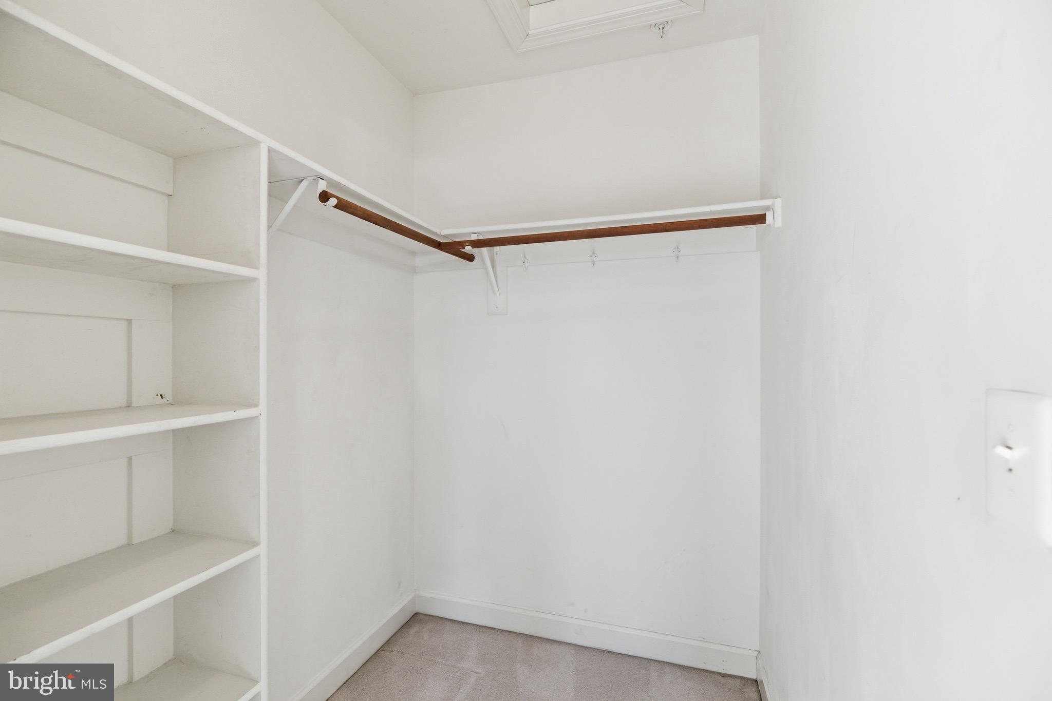 1817 Fallbrook Lane Vienna, VA 22182 - Photo 31 of 50 a view of an empty walk in closet