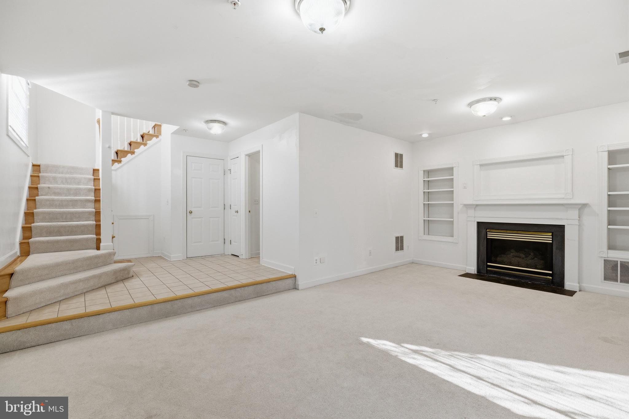1817 Fallbrook Lane Vienna, VA 22182 - Photo 33 of 50 a view of empty room with fireplace