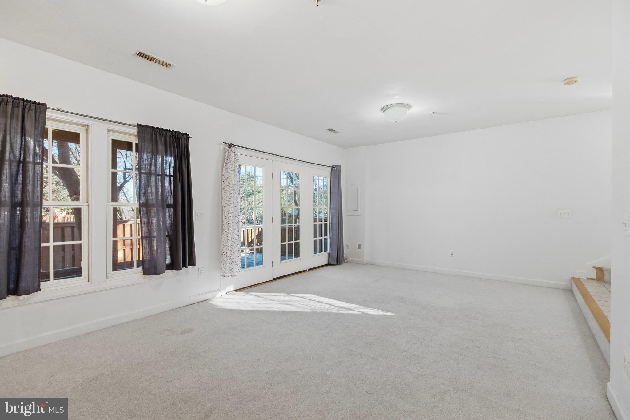 1817 Fallbrook Lane Vienna, VA 22182 - Photo 34 of 50 a view of a big room with windows and closet
