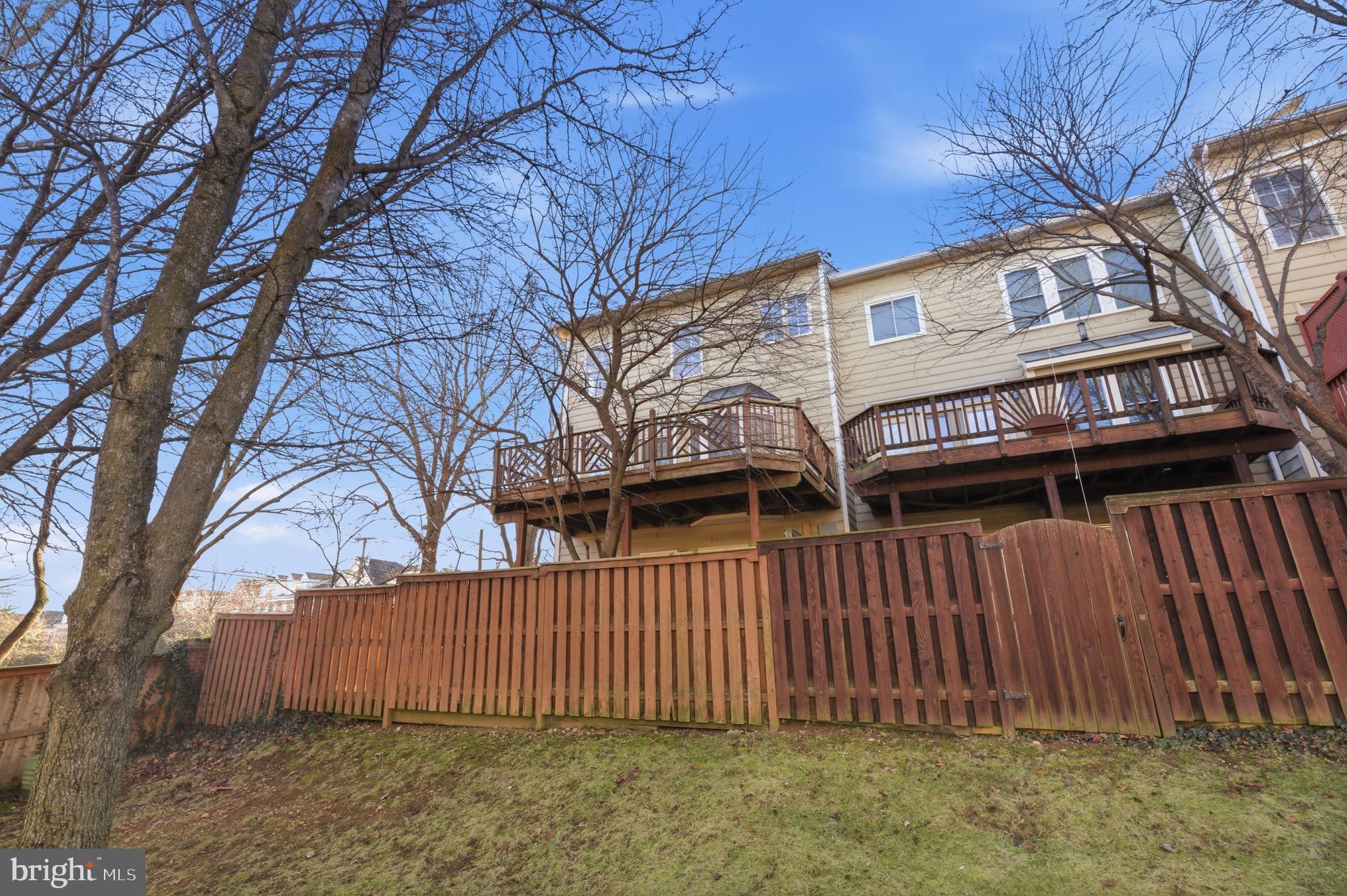 1817 Fallbrook Lane Vienna, VA 22182 - Photo 44 of 50 a view of a house with a wooden fence