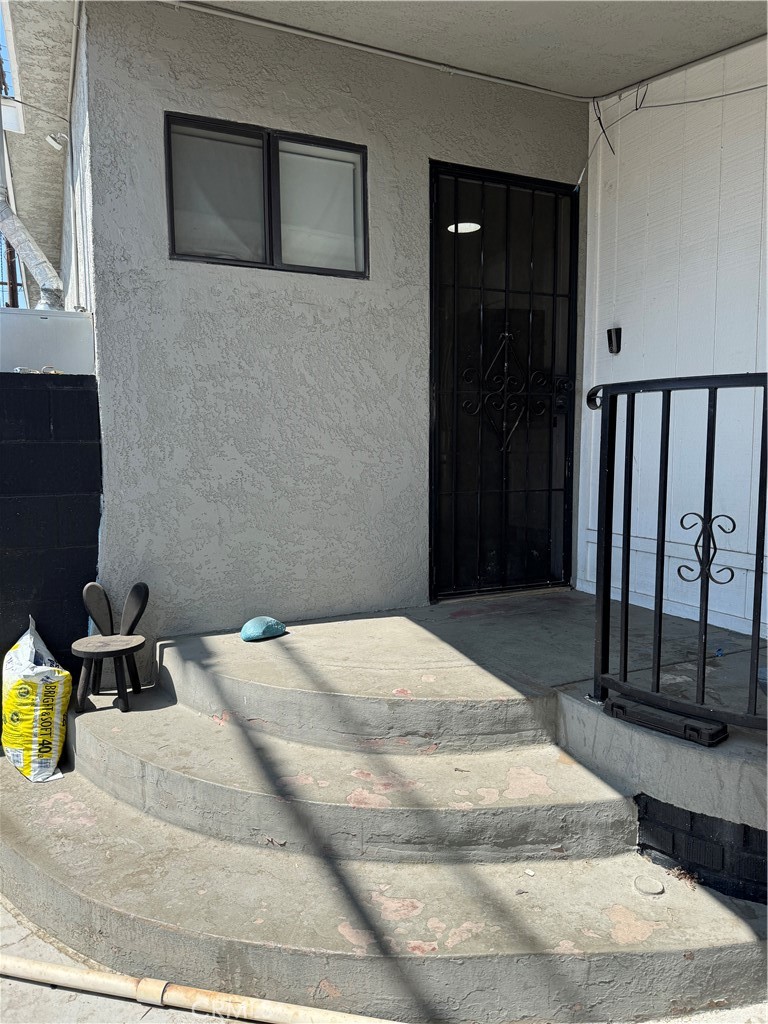 854 North 9th Street Colton, CA 92324 - Photo 12 of 36 a bedroom with a bed and a window