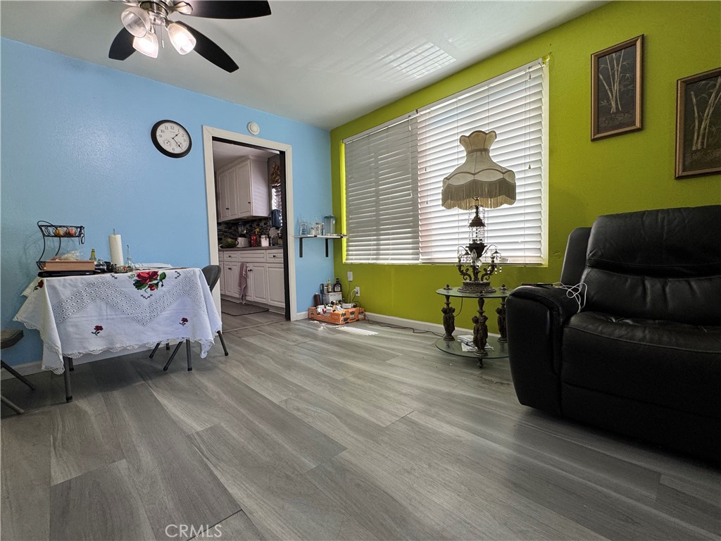 854 North 9th Street Colton, CA 92324 - Photo 13 of 36 a living room with furniture and a window