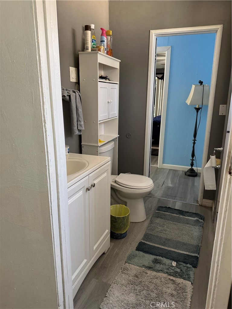 854 North 9th Street Colton, CA 92324 - Photo 21 of 36 a bathroom with a sink toilet and shower