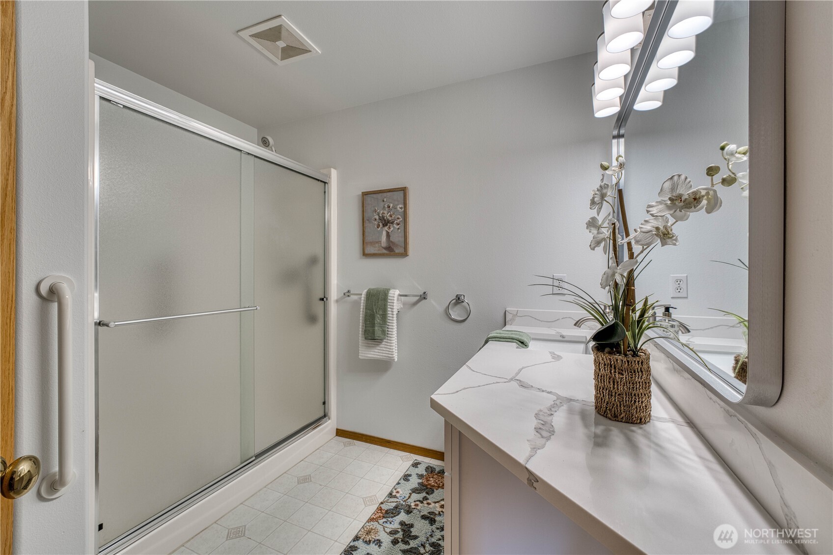 5203 53rd Street West University Place, WA 98467 - Photo 21 of 33 a dining room with table and hallway