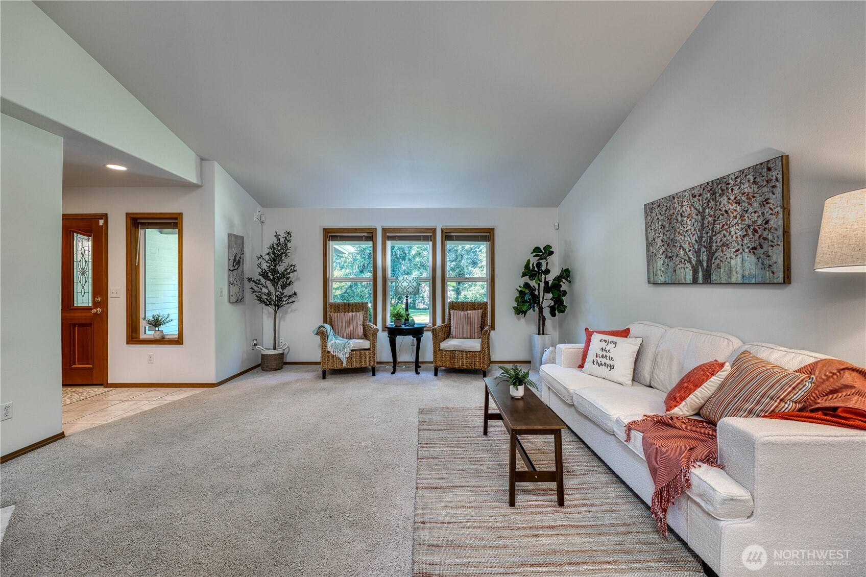 5203 53rd Street West University Place, WA 98467 - Photo 5 of 33 a living room with furniture and a potted plant