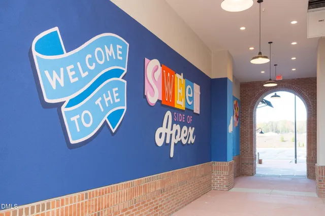 a view of a garden with houses